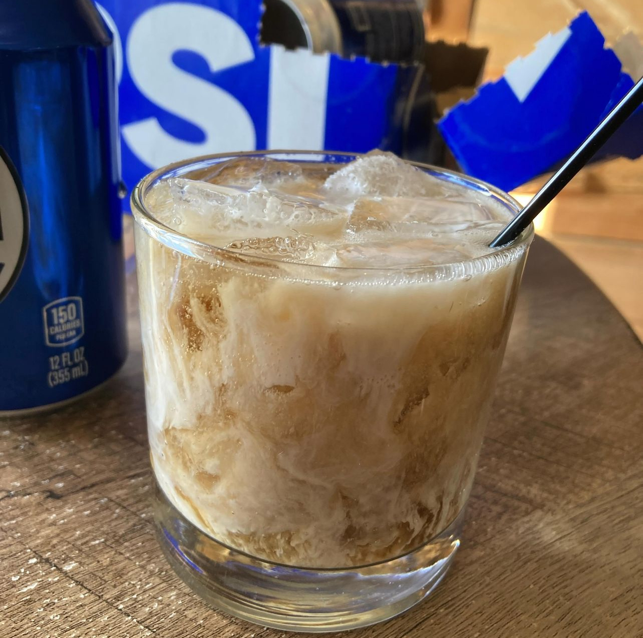 A creamy root beer whiskey cocktail over ice