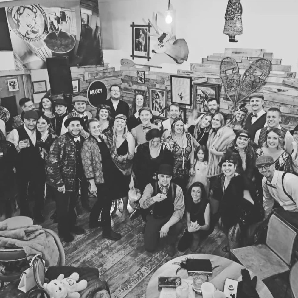 A full house in costume for the Prohibition Party