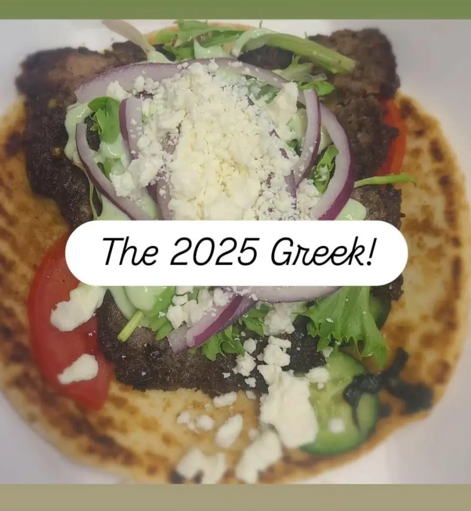 The 2025 Greek — local lamb on toasted pita with tzatziki and feta