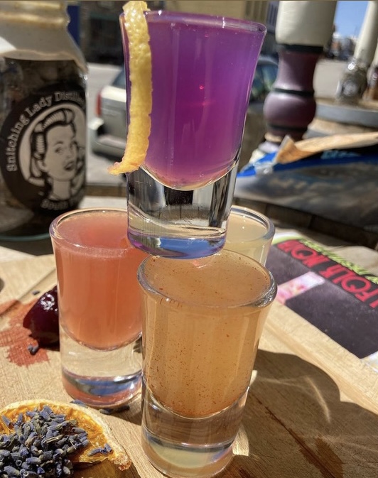 A cranberry crush against a mountain-stone wall