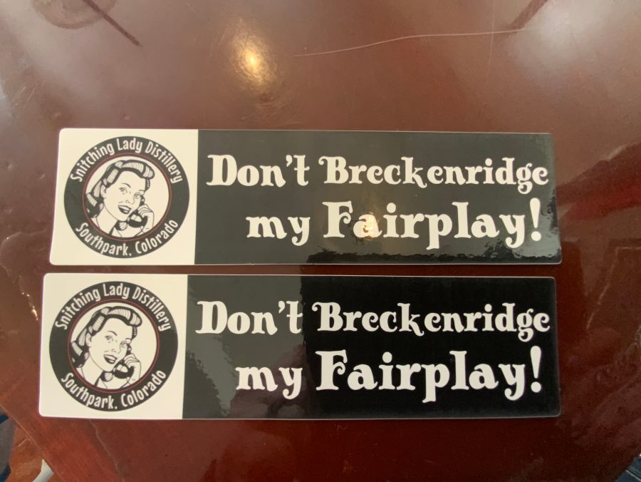 Black-and-white bumper stickers reading 'Don't Breckenridge my Fairplay!' with the Snitching Lady logo