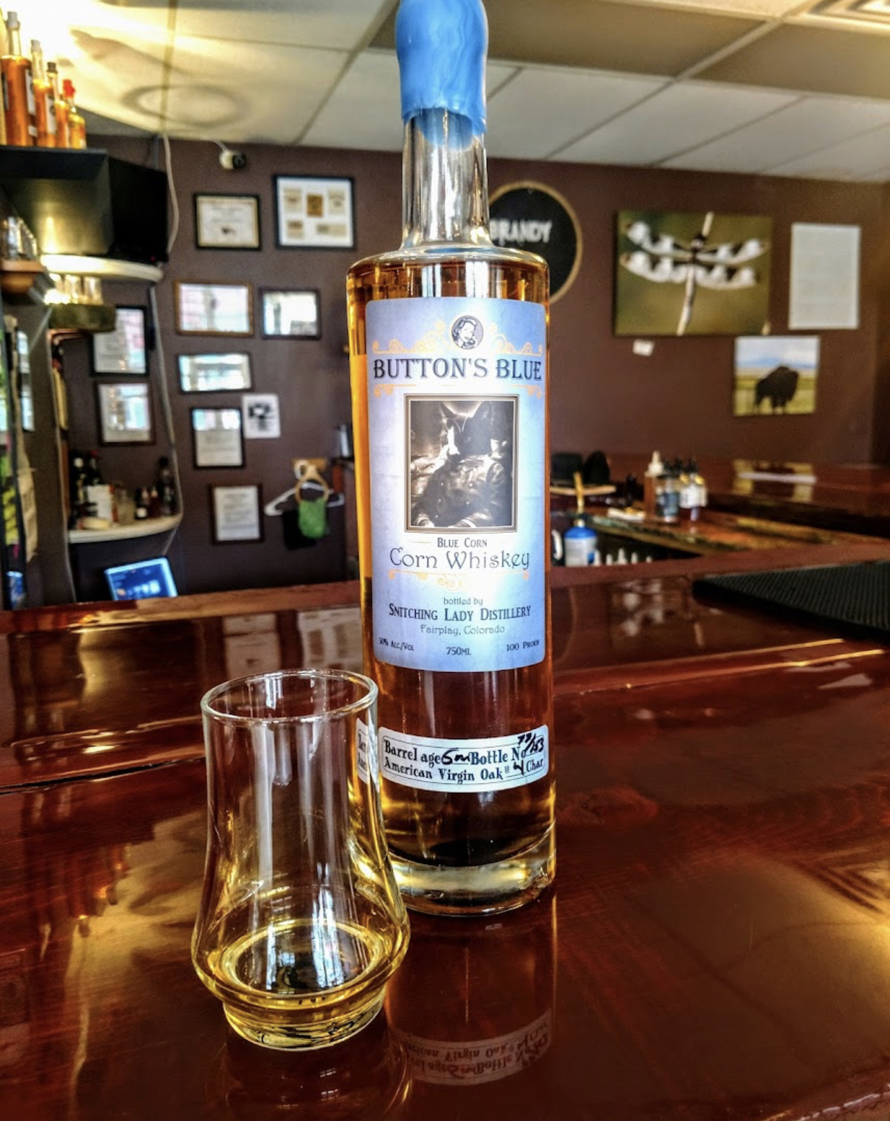 Button's Blue Corn Whiskey on the tasting-room bar